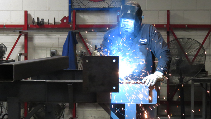 Seizmic fabricator welding a custom fabrication